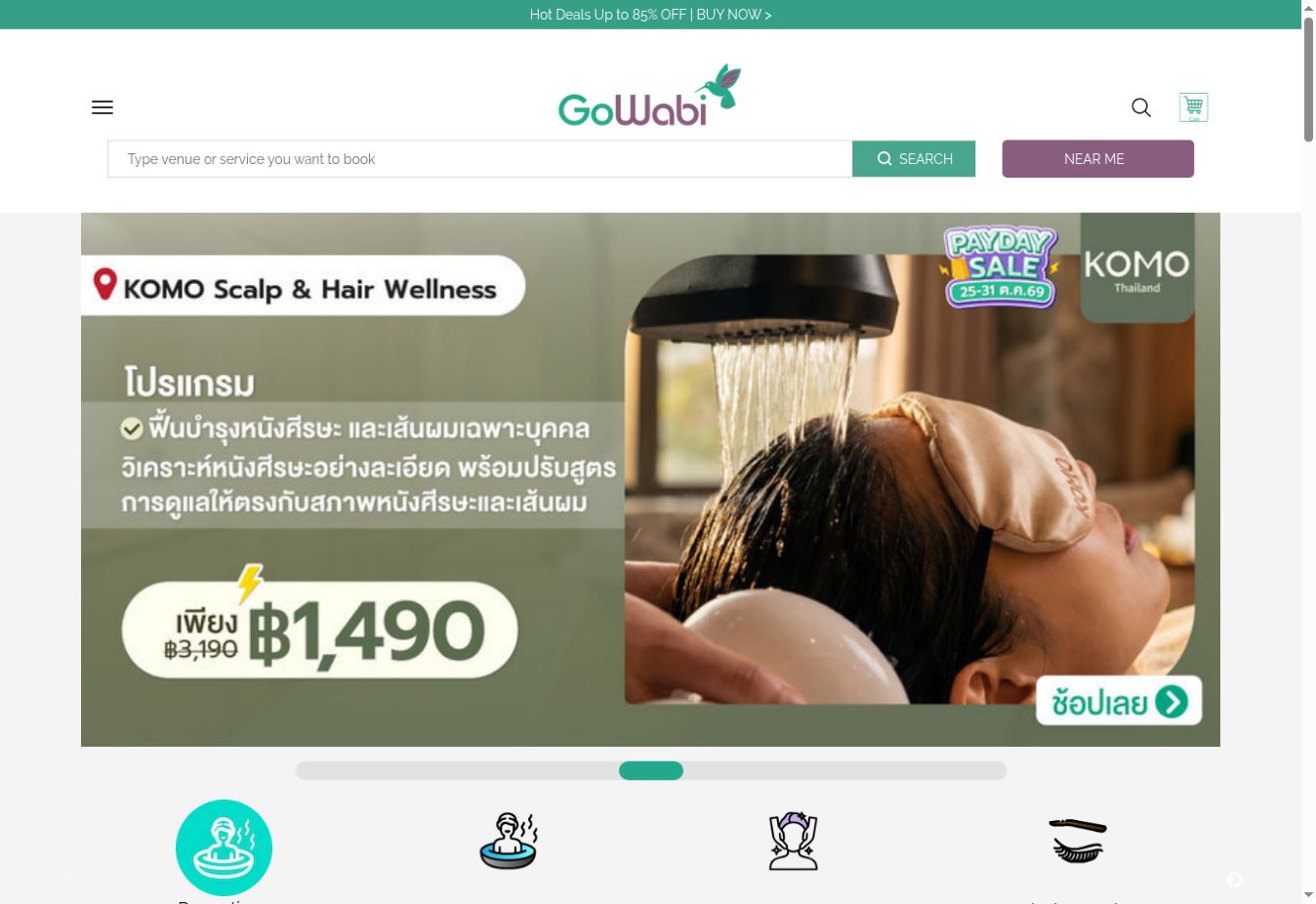 Public GoWabi homepage with the brand, a wellness promotion, service categories, and a search field. Public website context, not a booking-engine delivery.